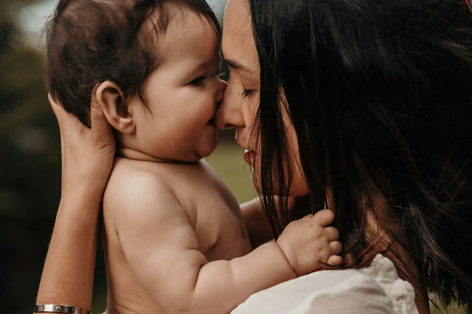 Mother and baby face to face